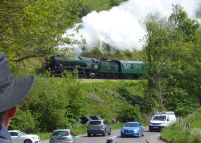 Photo of 34028 Eddystone locomotive taken as walkers wait in Corfe Castle for the bus back to Swanage – May 8, 2024