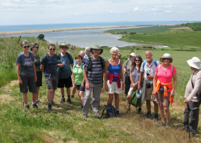 Photo of walkers with Chisel Bank in the distance – June 19, 2024