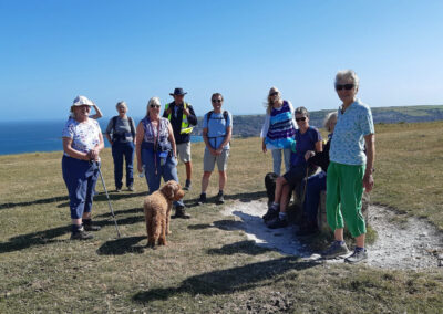 Photo of walkers at the top of Ballard Down – July 4, 2024