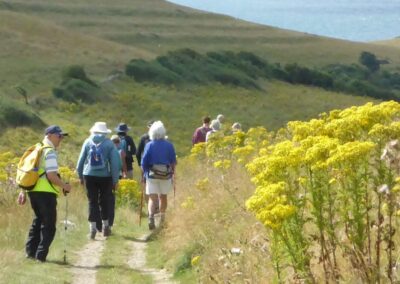 Photo of walkers on the path from Worth Matravers to Winspit – August 7, 2024