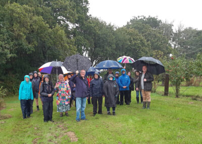 Photo taken during group's very wet visit to Dorset Cider Farm – September 5, 2024