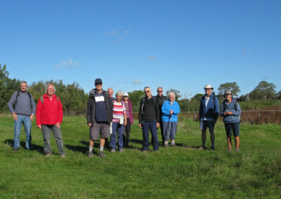 Group photo with Christchurch Priory in the background – September 28, 2024