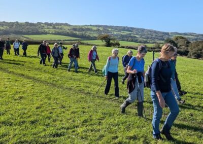 Photo of walkers nearing Corfe Castle – October 26, 2024