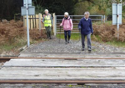 Photo of walkers crossing the Swanage Railway tracks – November 9, 2024