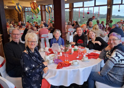 Photo of members enjoying the annual Christmas lunch – December 11, 2024