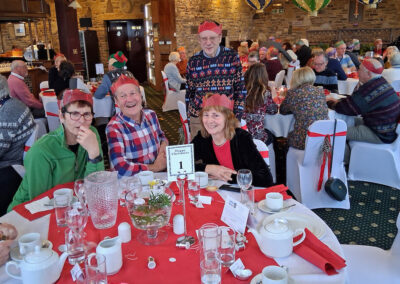 Photo of members enjoying Christmas lunch – December 11, 2024