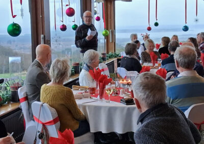 Photo of the group's chairman speaking at the annual Christmas lunch – December 11, 2024