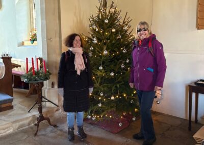 Photo of walkers with Christmas tree Inside St James' Church, Alderholt – December 14, 2024