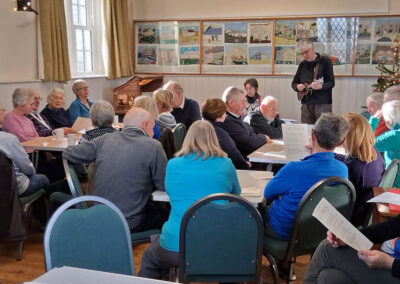 Photo taken at post-walk sing-along in Worth Matravers village hall – December 18, 2024