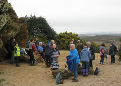 Group photo at Agglestone Rock – January 15, 2025