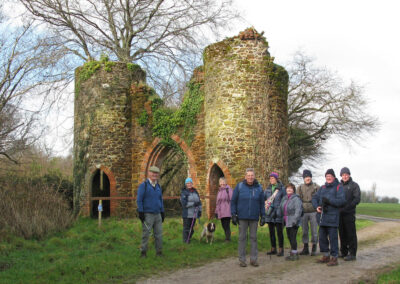 Group photo of walkers at the ruins of Clare Towers, Lulworth Castle – February 9, 2025