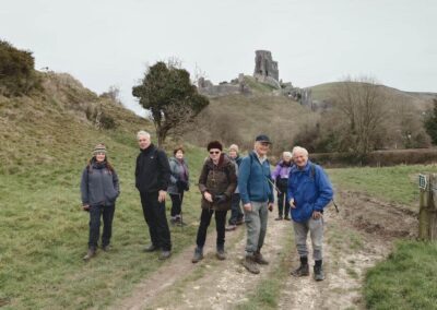 A group photo with Corfe Castle in the background – February 15, 2025